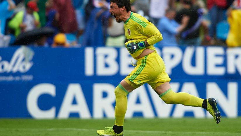 A keeper nails the 97th-minute header to save the Spanish once giants