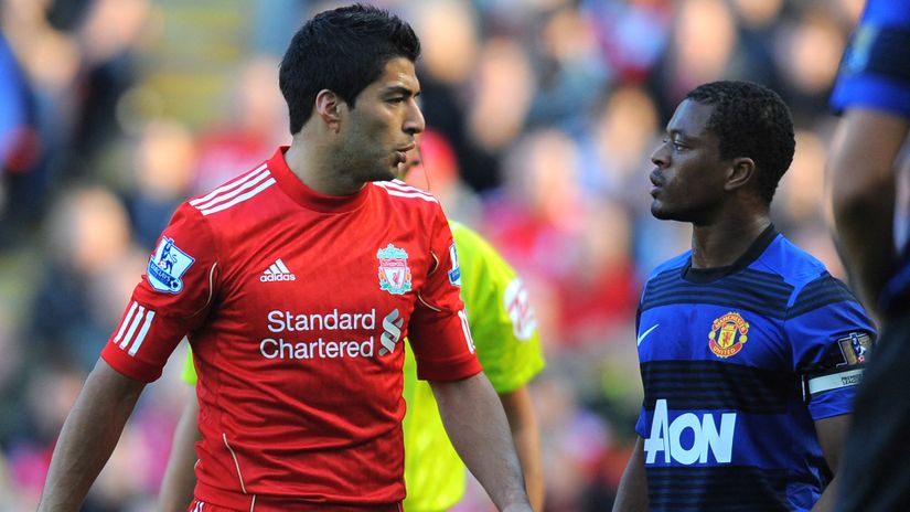 Luis Suarez escaped a punch from Patrice Evra twice