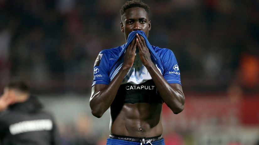 Woman caught on camera spitting at Okumu identified